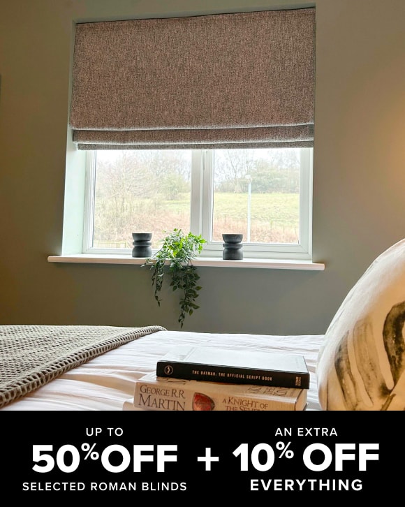 Roman blind in a bedroom - up to 50% off selected Roman blinds plus an extra 15% off everything