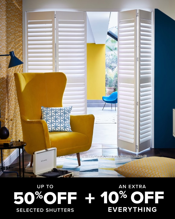 White tracked shutters in home office - up to 50% off selected shutters plus an extra 15% off everything